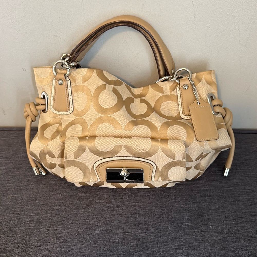 Coach Vintage gold fabric handbag.